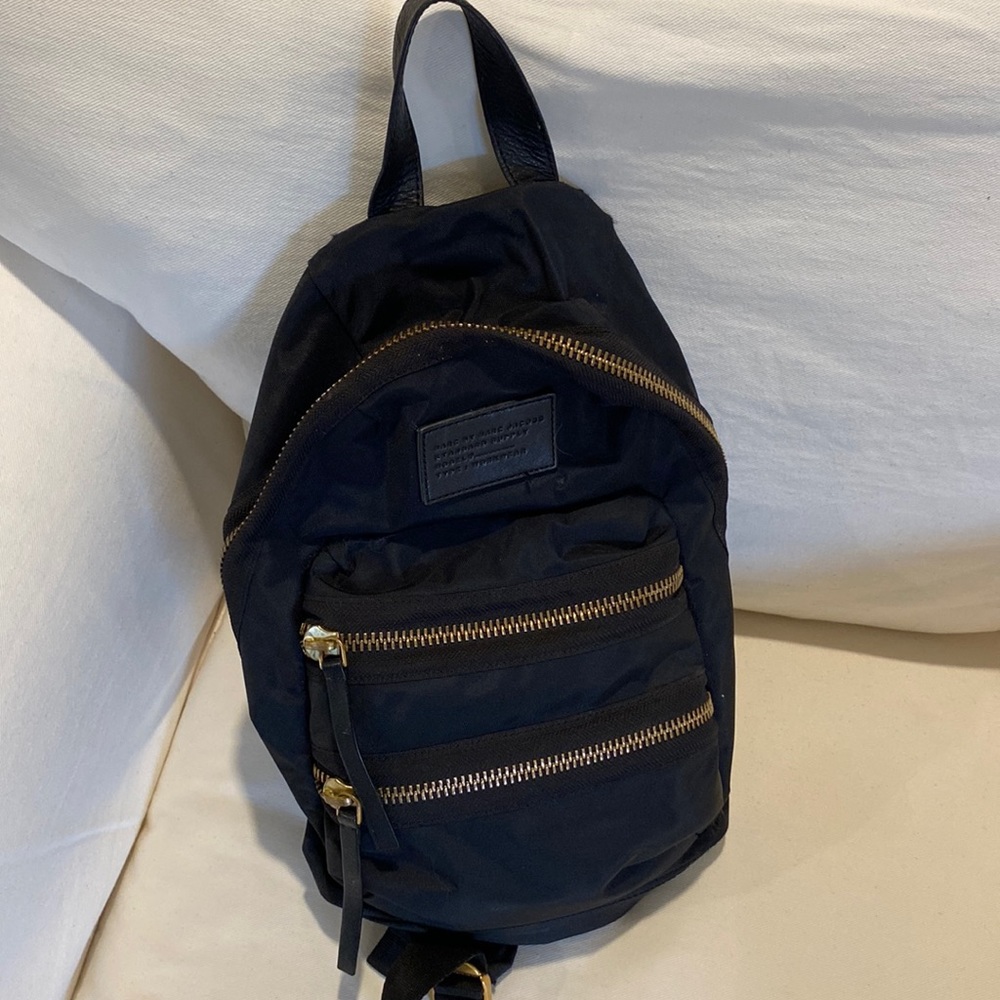 Black Backpack with Gold Accents